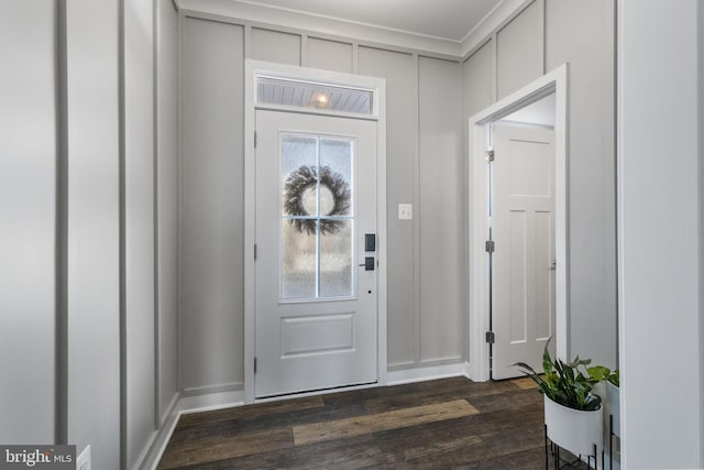 entryway with dark wood-type flooring