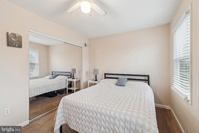 bedroom featuring carpet floors, a closet, and ceiling fan