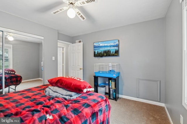 carpeted bedroom featuring ceiling fan