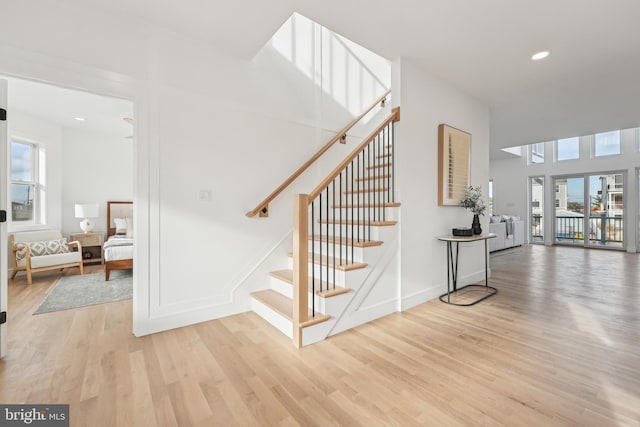 staircase featuring hardwood / wood-style flooring