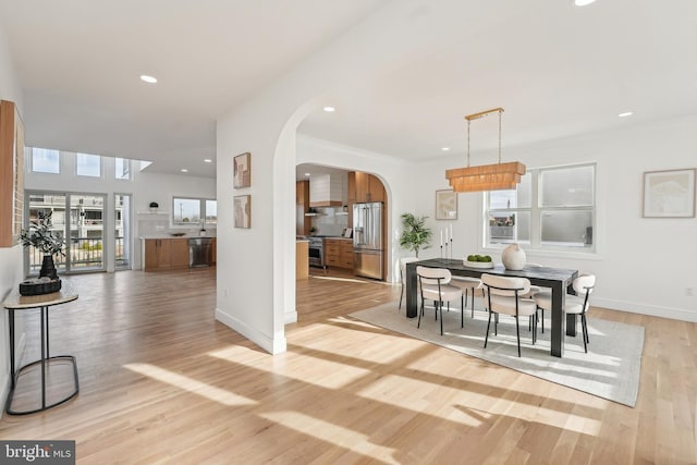 dining area with light wood-type flooring