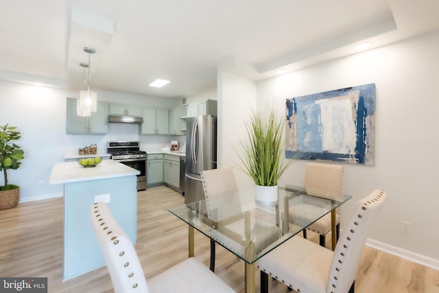 dining room with light hardwood / wood-style floors