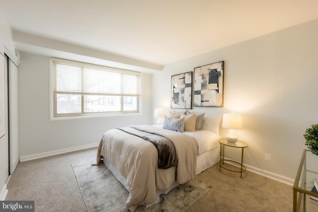 bedroom with light carpet