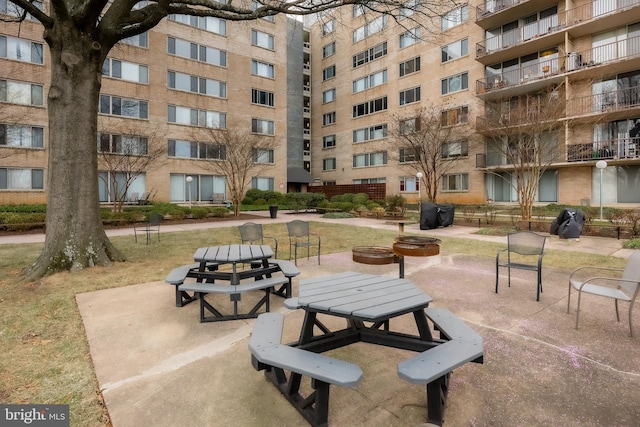 view of property's community with a patio