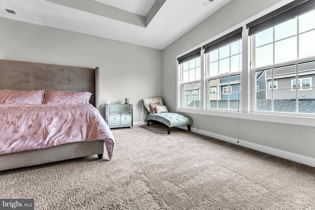 bedroom featuring carpet