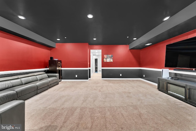 home theater with light colored carpet