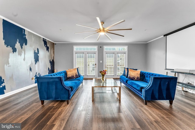 living room with dark hardwood / wood-style floors, ceiling fan, crown molding, and french doors