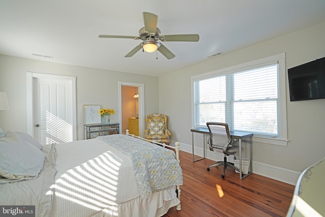 bedroom featuring hardwood / wood-style flooring and ceiling fan