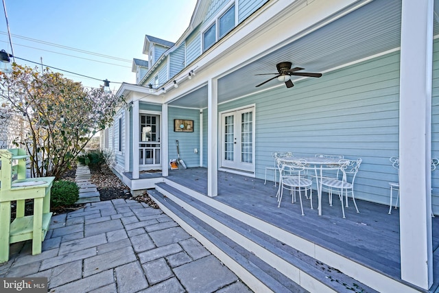 view of patio with french doors, ceiling fan, and a wooden deck