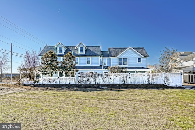 view of front of home with a front yard