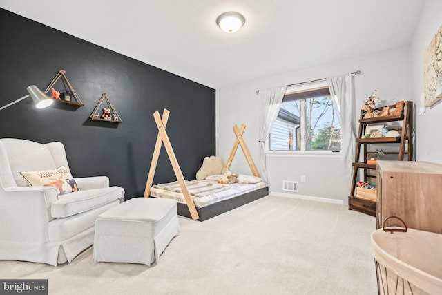 bedroom featuring carpet