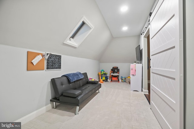 game room featuring a barn door, light colored carpet, and lofted ceiling