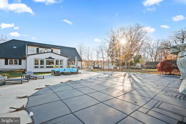 view of pool featuring an outdoor living space and a patio