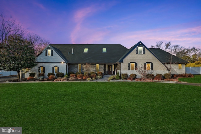 view of front of home featuring a yard