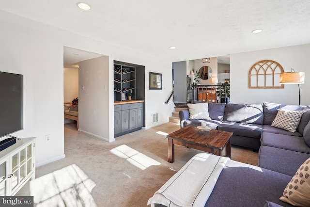 living room with light carpet