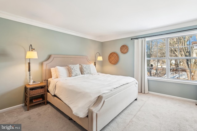 carpeted bedroom featuring ornamental molding