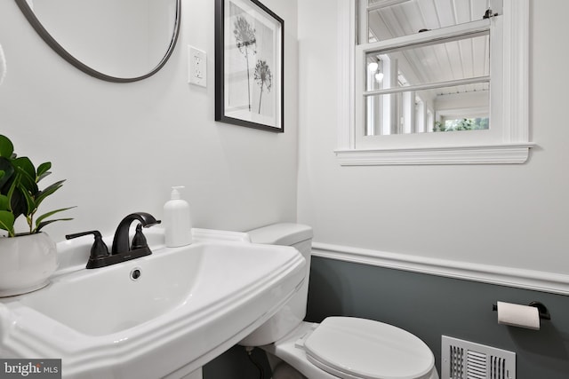 bathroom with sink and toilet