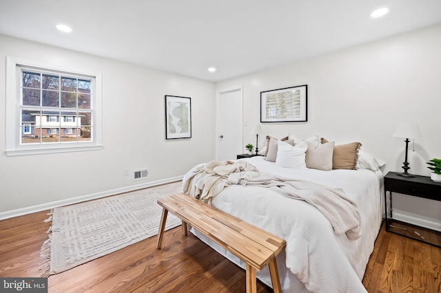 bedroom featuring hardwood / wood-style flooring