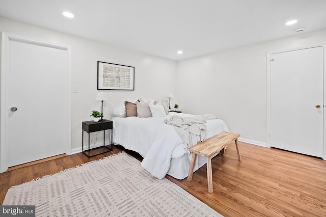 bedroom featuring hardwood / wood-style floors