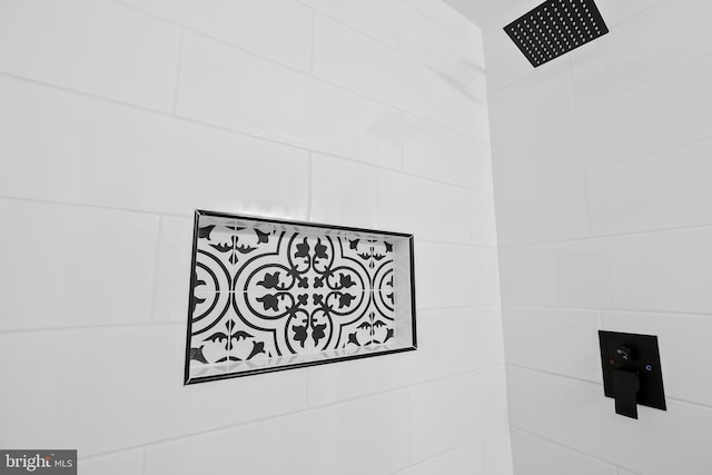 room details with a tile shower