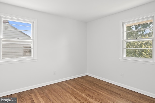 empty room featuring hardwood / wood-style floors