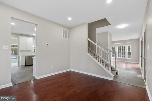 spare room with hardwood / wood-style floors