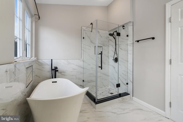 bathroom with independent shower and bath and tile walls