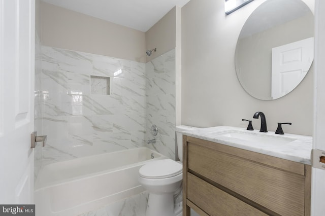 full bathroom featuring vanity, toilet, and tiled shower / bath