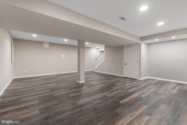 basement featuring dark wood-type flooring