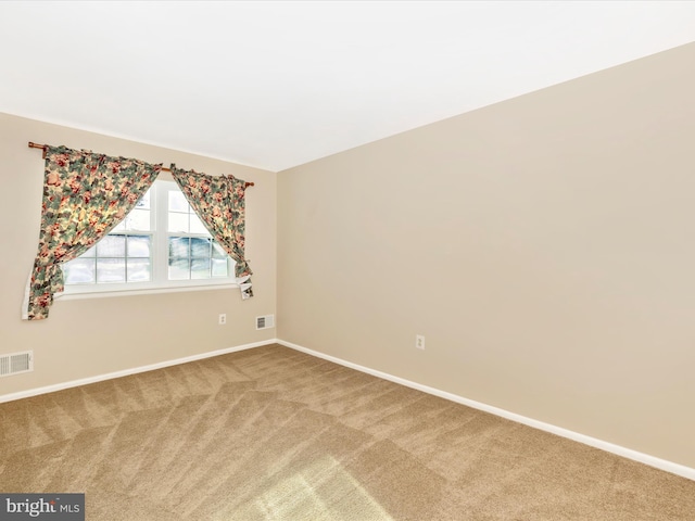 view of carpeted spare room