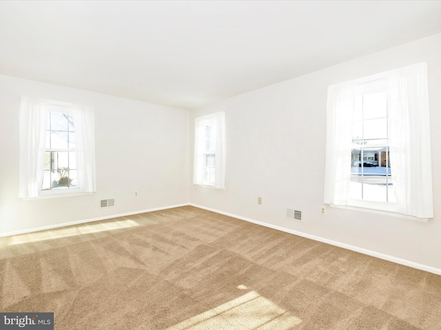 view of carpeted spare room