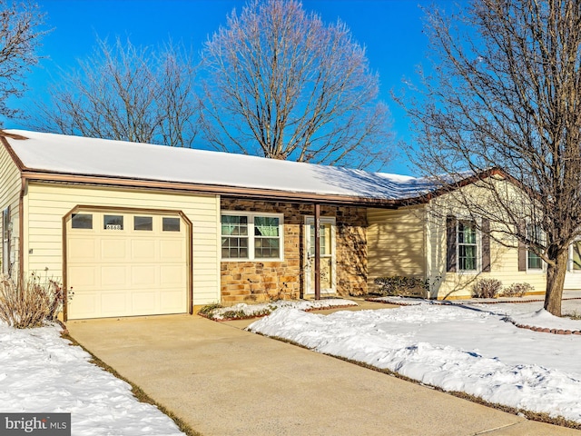 ranch-style home with a garage