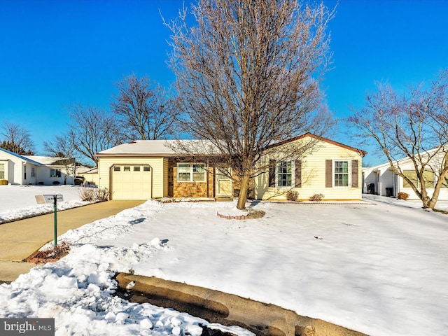 single story home featuring a garage