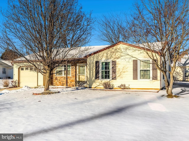 single story home with a garage