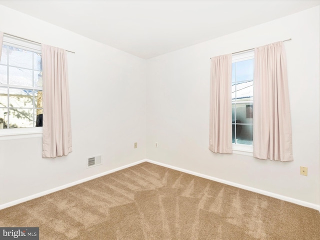 view of carpeted spare room