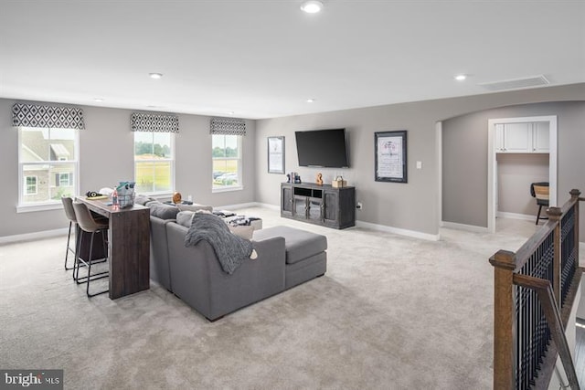 living room with light colored carpet