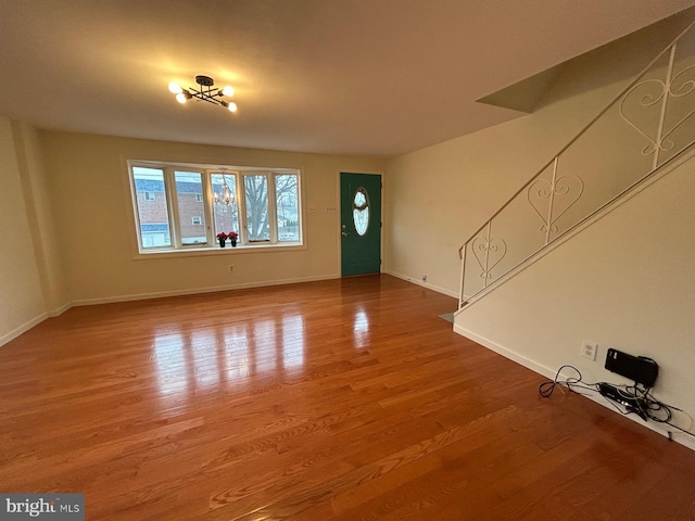 foyer with wood-type flooring