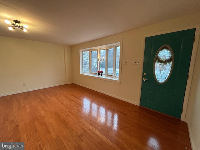 entrance foyer featuring hardwood / wood-style floors