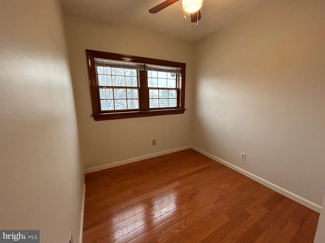 unfurnished room with hardwood / wood-style floors and ceiling fan