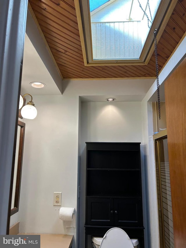 bathroom with wooden ceiling