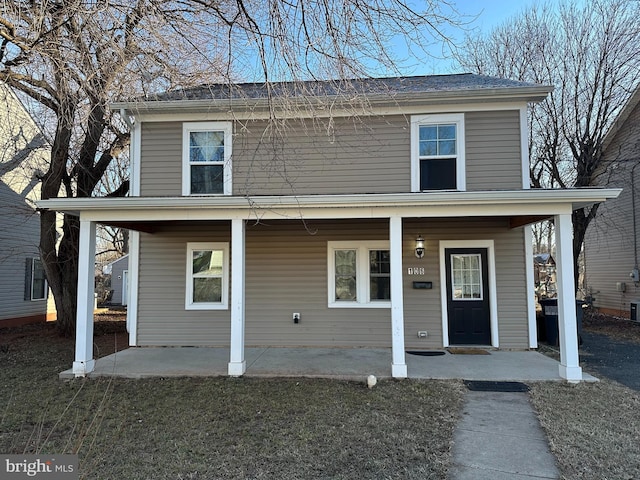 view of front property featuring a porch