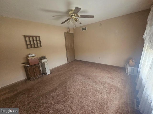 interior space featuring ceiling fan