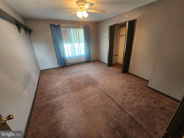 unfurnished bedroom with carpet floors, ceiling fan, and a closet