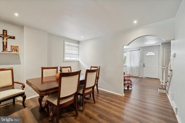 dining area featuring dark hardwood / wood-style floors