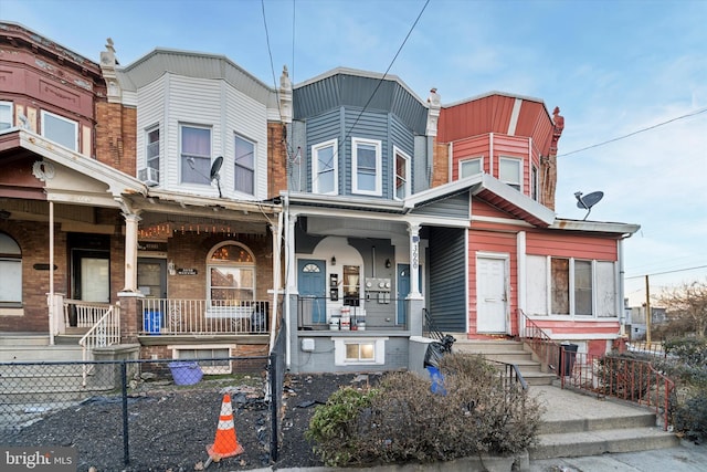 multi unit property featuring covered porch