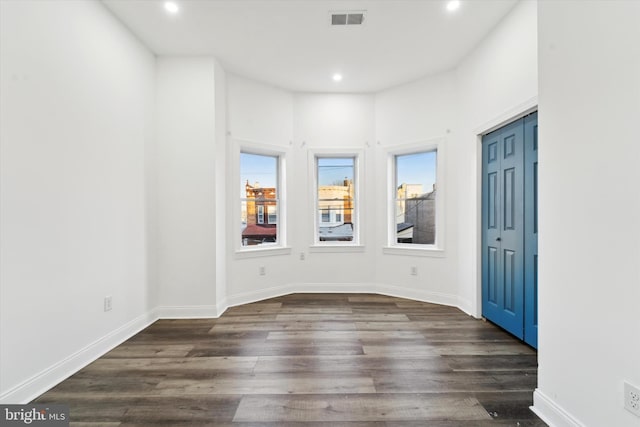 foyer featuring dark hardwood / wood-style floors