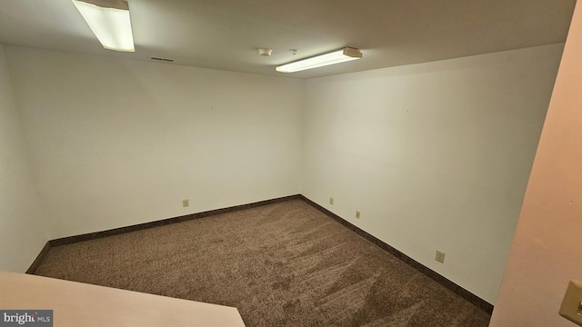 spare room with carpet