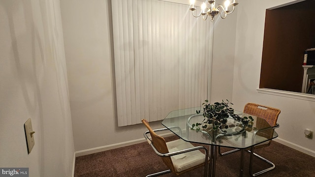 carpeted dining space featuring a chandelier