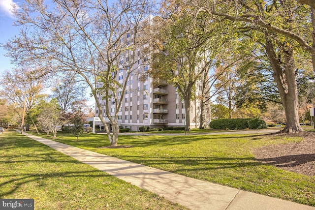 surrounding community featuring a lawn