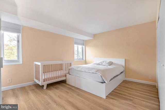 bedroom featuring light hardwood / wood-style floors